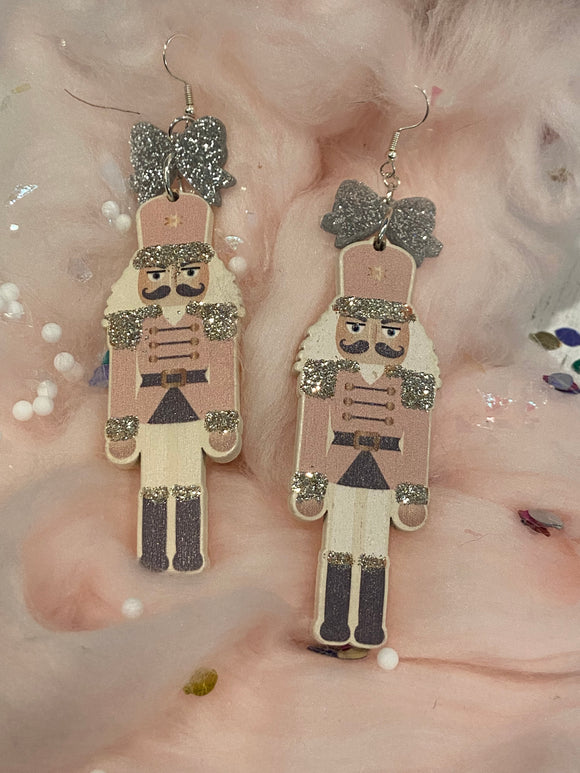 With A Bow On top Nutcracker Earrings